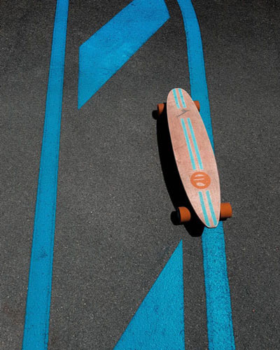 blue skateboard in the road