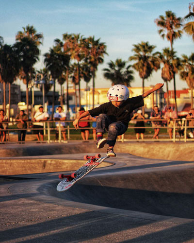 kid performing a skate trick
