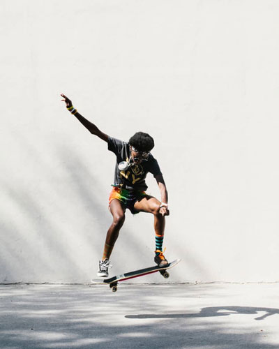 girl doing a skateboard trick